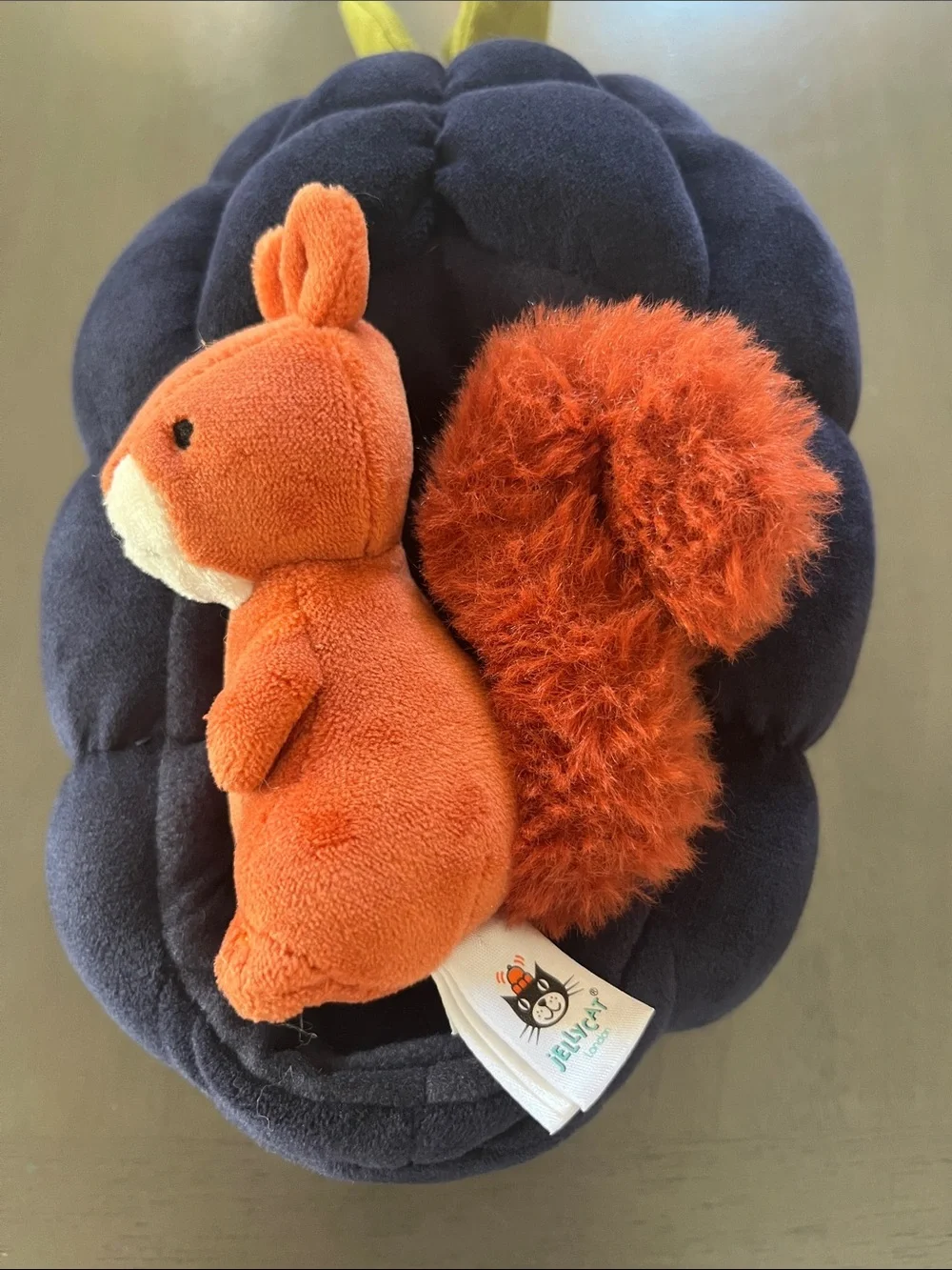 Jellycat Orange Squirrel with Fluffy Tail in Navy Plush Nest